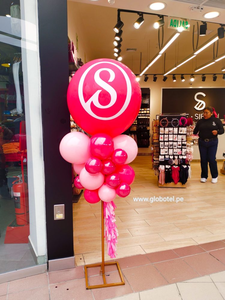 Columna de globos para inauguración de tienda. Globos publicitarios estampados